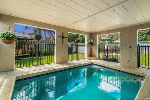 Photo of 944 Hansen Street, West Palm Beach, FL 33405 (MLS # RX-11125862)