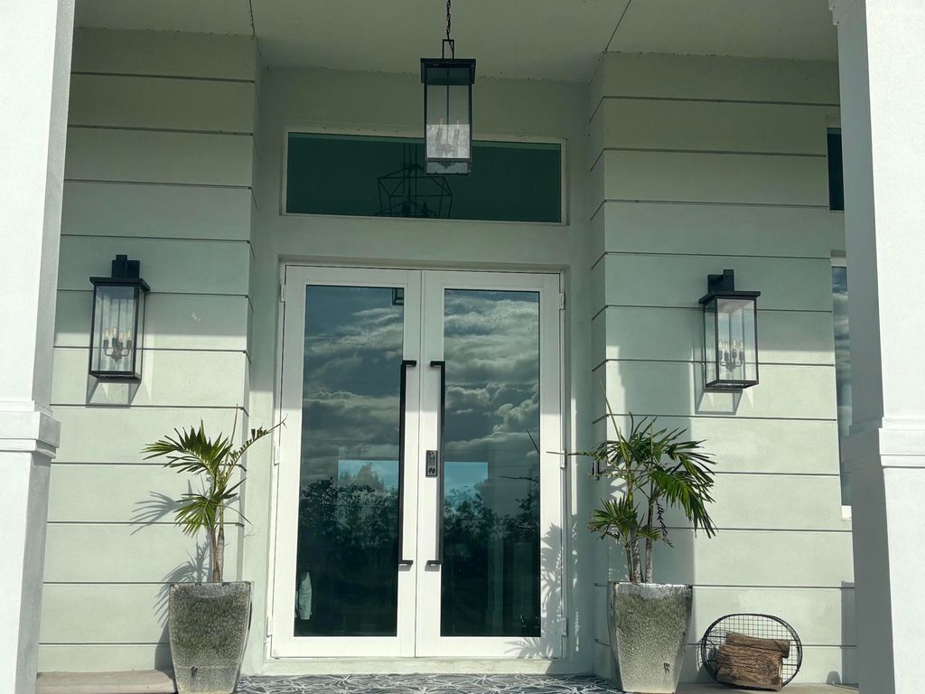 Photo of 1071 S Header Canal Road, Fort Pierce, FL 34945 (MLS # RX-11078132)