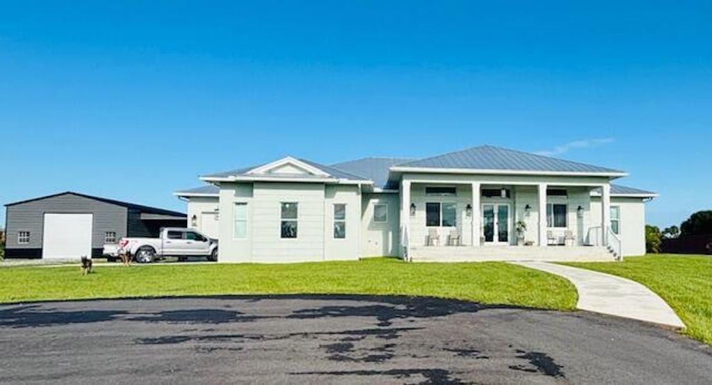 Photo of 1071 S Header Canal Road, Fort Pierce, FL 34945 (MLS # RX-11078132)