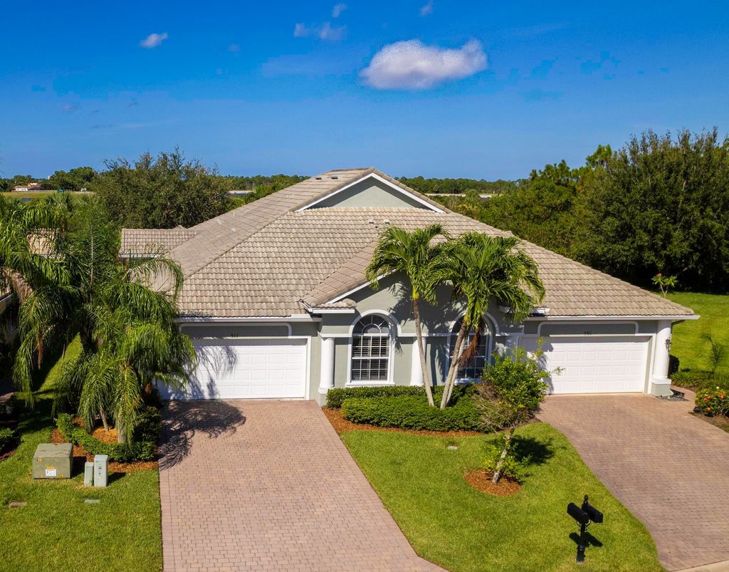 Photo of 511 NW Red Pine Way, Jensen Beach, FL 34957 (MLS # RX-11075537)