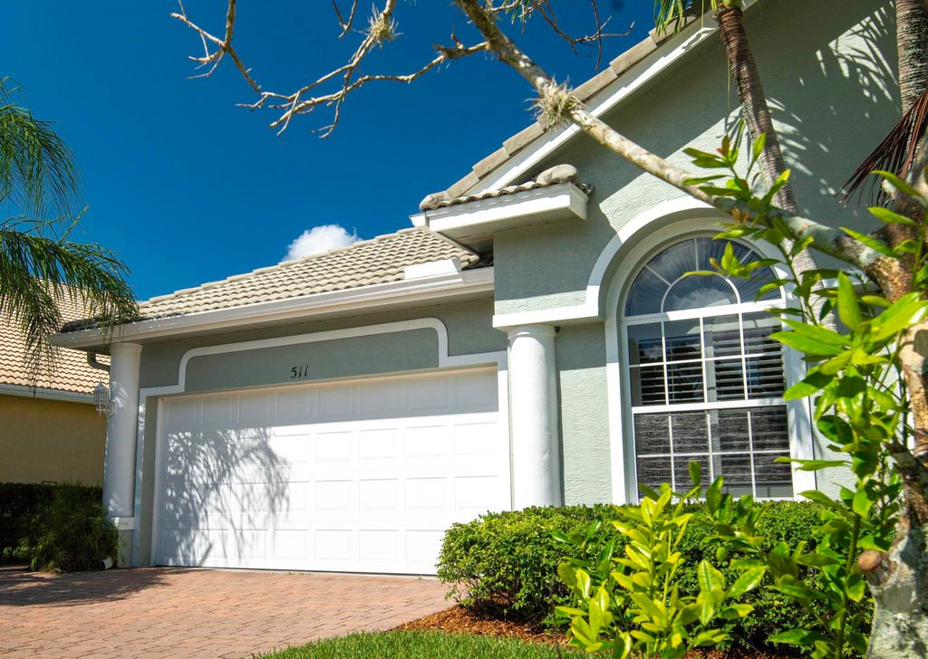 Photo of 511 NW Red Pine Way, Jensen Beach, FL 34957 (MLS # RX-11075537)