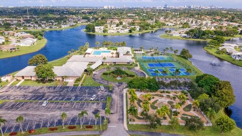Photo of 5322 Garrett Lane, West Palm Beach, FL 33417 (MLS # RX-11126241)