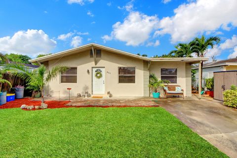 Photo of 317 Perry Avenue, Greenacres, FL 33463 (MLS # RX-11129424)