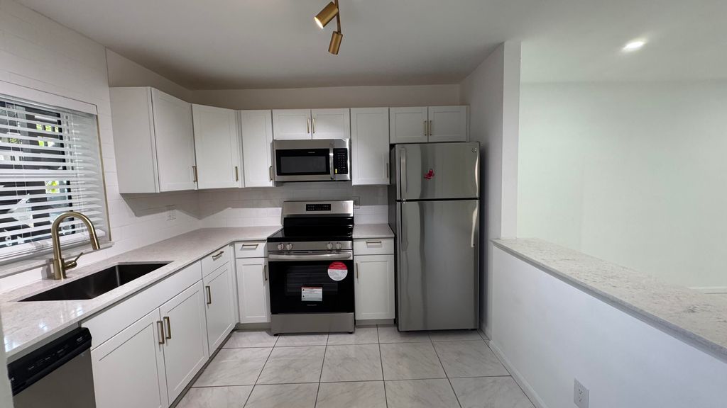 Photo of 6531 SE Federal Highway #J104, Stuart, FL 34997 (MLS # RX-11115402)