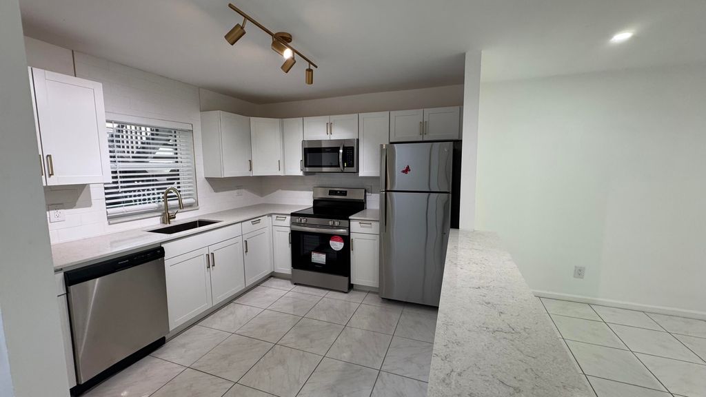 Photo of 6531 SE Federal Highway #J104, Stuart, FL 34997 (MLS # RX-11115402)