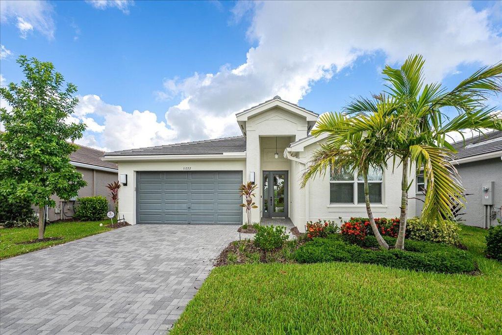 Photo of 11722 SW Oceanus Boulevard, Port Saint Lucie, FL 34987 (MLS # RX-11114322)