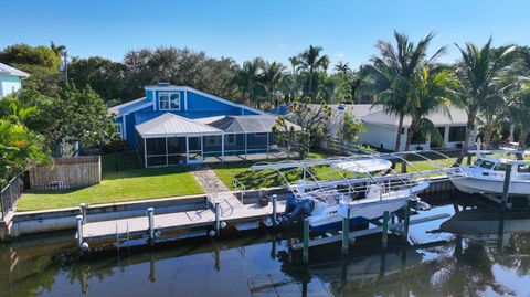 Photo of 1319 SW Dyer Point Road, Palm City, FL 34990 (MLS # RX-11052690)