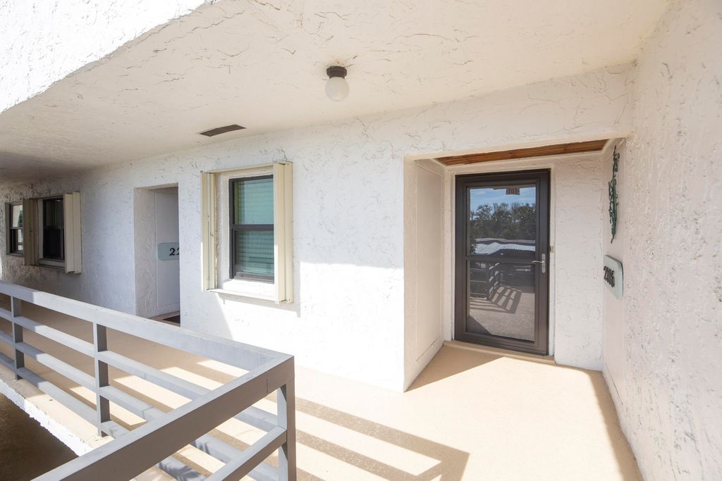 Photo of 1950 SW Palm City Road Rd #2-206, Stuart, FL 34994 (MLS # RX-11057121)