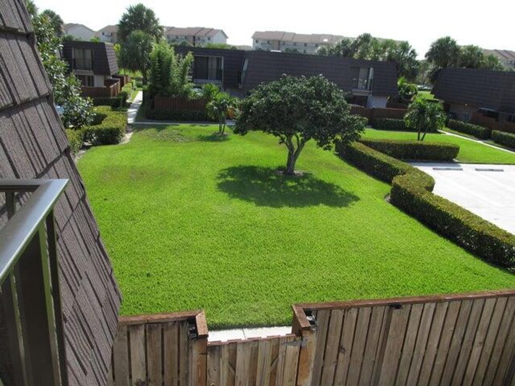 Photo of 1505 15th Court #75-A, Jupiter, FL 33477 (MLS # RX-11113411)