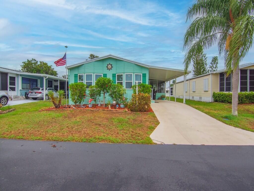 Photo of 495 Tropical Isles Circle, Fort Pierce, FL 34982 (MLS # RX-11087562)