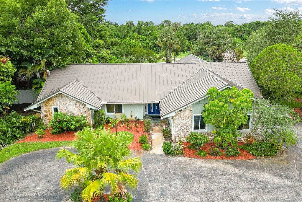 Photo of 1614 SW Saint Andrews Drive, Palm City, FL 34990 (MLS # RX-11088564)