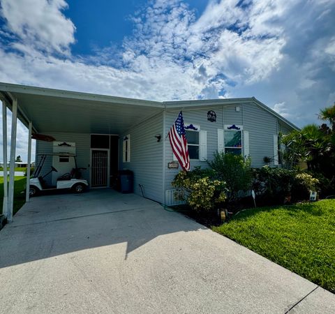 Photo of 14995 Agulia Avenue, Fort Pierce, FL 34951 (MLS # RX-11122812)