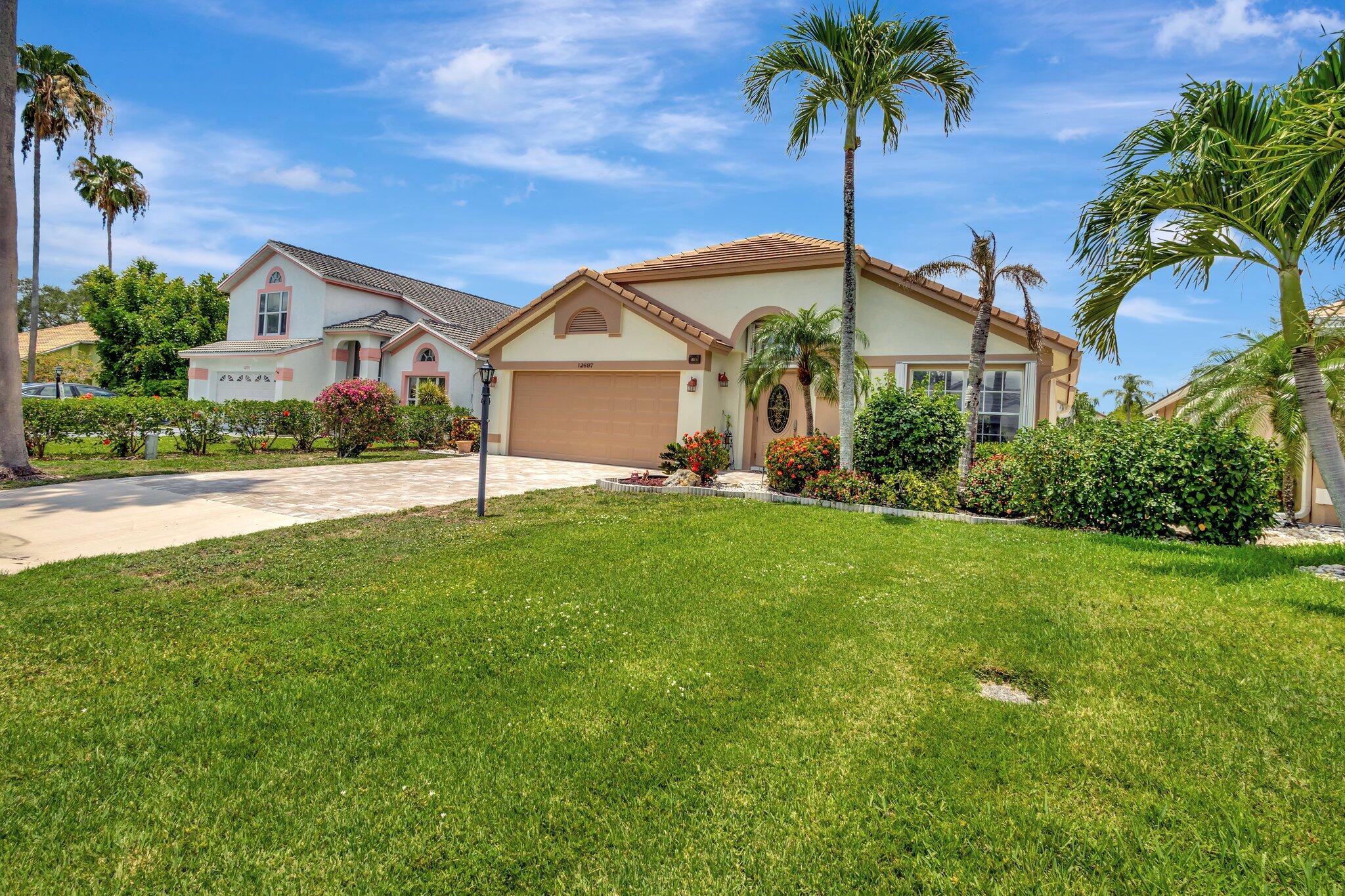 Property for Sale at 12697 Coral Breeze Drive, Wellington, Palm Beach County, Florida - Bedrooms: 3 
Bathrooms: 2  - $549,000