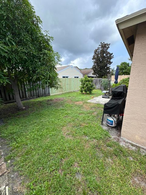 Photo of 5621 Azalea Circle, West Palm Beach, FL 33415 (MLS # RX-11129100)