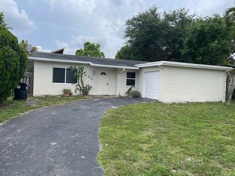 Photo of 405 SW 77th Avenue, North Lauderdale, FL 33068 (MLS # RX-11097661)