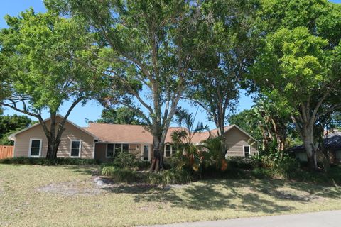 Photo of 1087 NE Quinn Place, Jensen Beach, FL 34957 (MLS # RX-11090152)