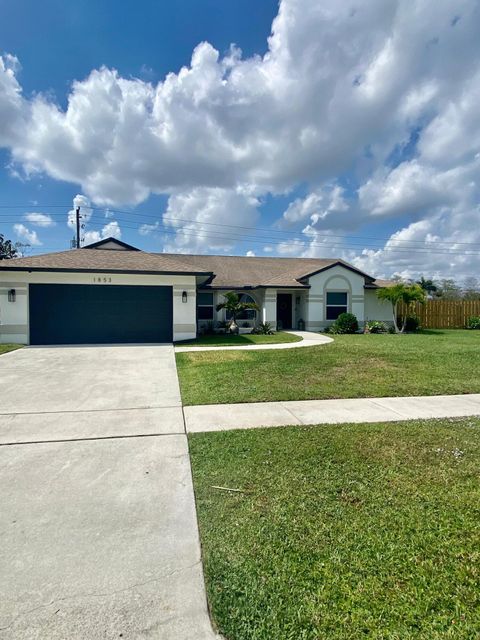Photo of 1853 Shower Tree Way, Wellington, FL 33414 (MLS # RX-11129362)