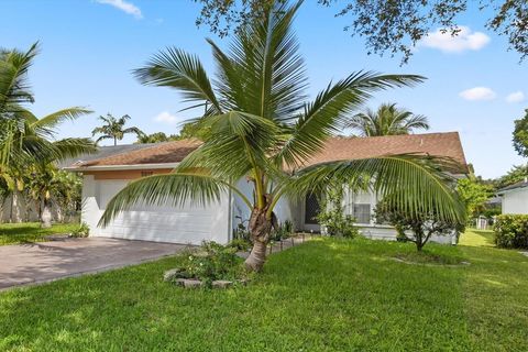 Photo of 5015 Foxhall Drive N, West Palm Beach, FL 33417 (MLS # RX-11128593)