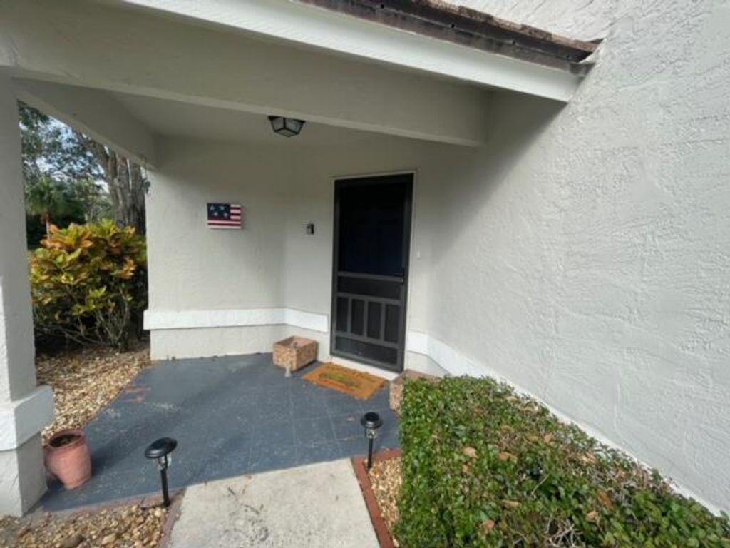 Photo of 800 Kintyre Court, Palm Beach Gardens, FL 33418 (MLS # RX-10967316)