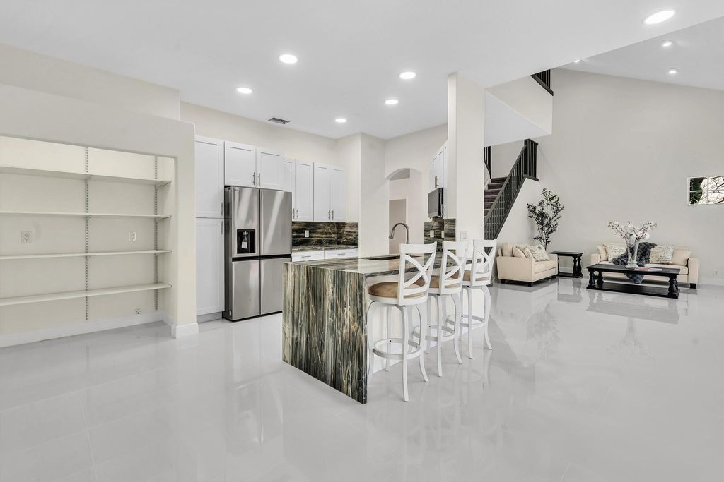 Photo of 36 Monterey Pointe Drive, Palm Beach Gardens, FL 33418 (MLS # RX-11116305)