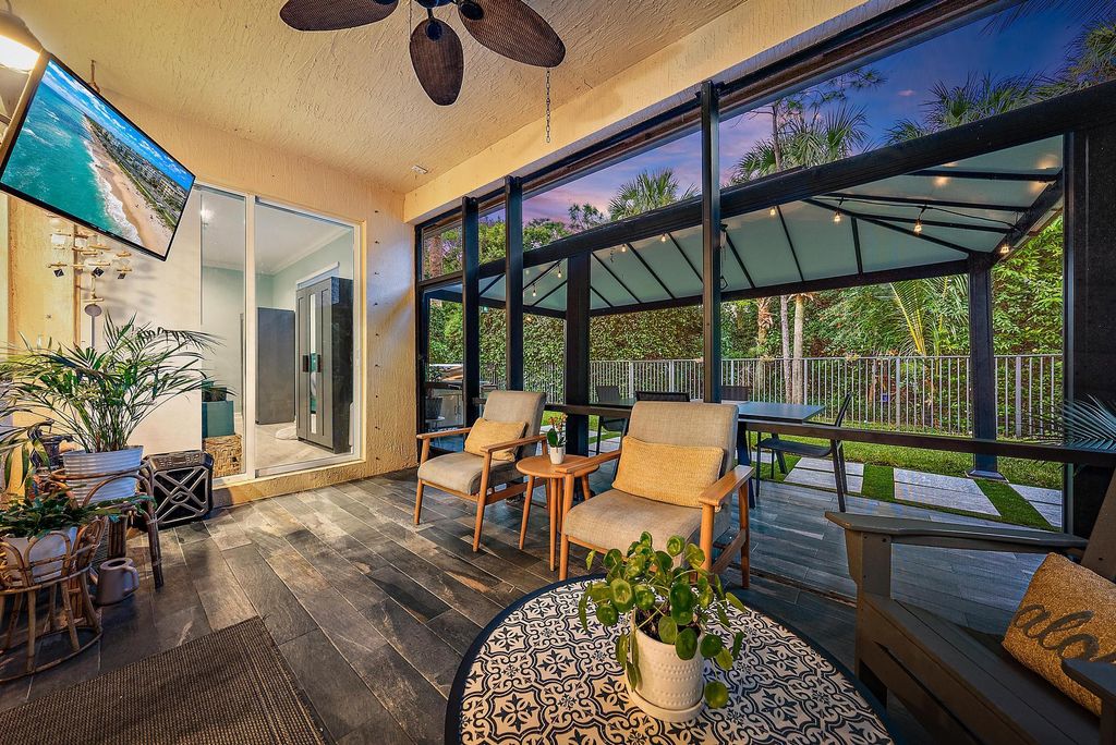 Photo of 5919 SE Crooked Oak Avenue, Hobe Sound, FL 33455 (MLS # RX-11121712)