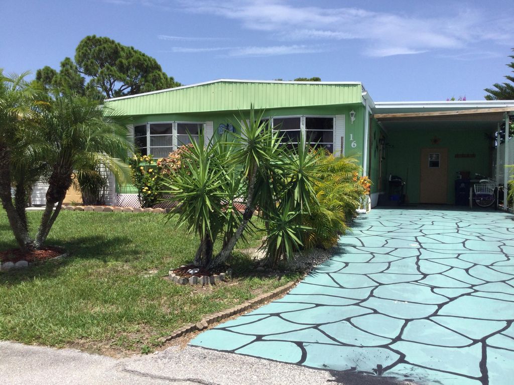 Photo of 16 S Granada Ln, Port Saint Lucie, FL 34952 (MLS # RX-11104152)