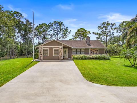 Photo of 17876 43rd Road N, Loxahatchee, FL 33470 (MLS # RX-11128243)