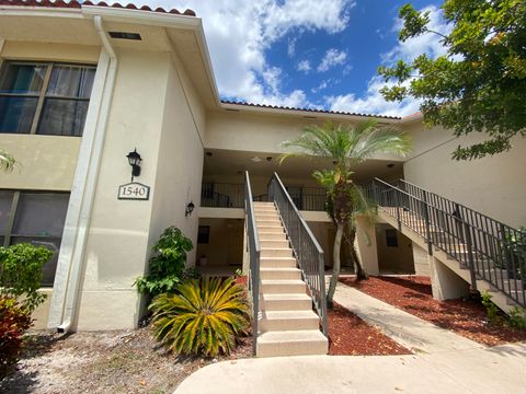 Photo of 1540 Windorah Way #F, West Palm Beach, FL 33411 (MLS # RX-11128587)
