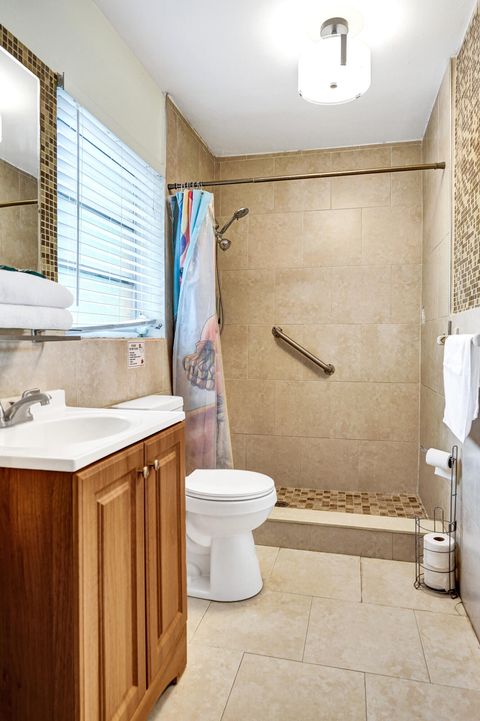 Tiny photo for 4460 NE 17th Terrace, Oakland Park, FL 33334 (MLS # RX-11120847)