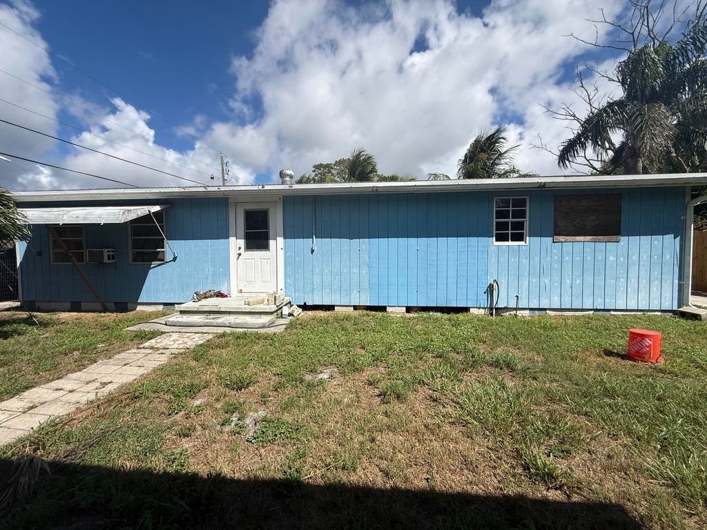 Photo of 3752 SE Lincoln Street, Stuart, FL 34997 (MLS # RX-11118572)