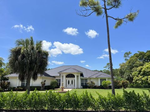 Photo of 103 Squire Drive, Wellington, FL 33414 (MLS # RX-11098422)