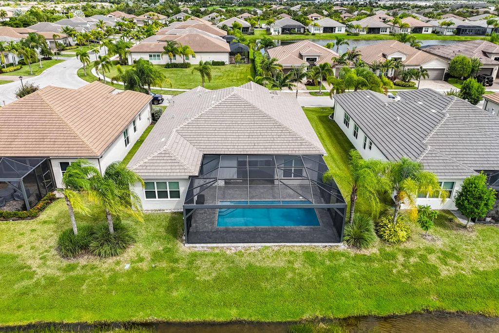 Photo of 10985 SW Ivory Springs Lane, Port Saint Lucie, FL 34987 (MLS # RX-11128951)