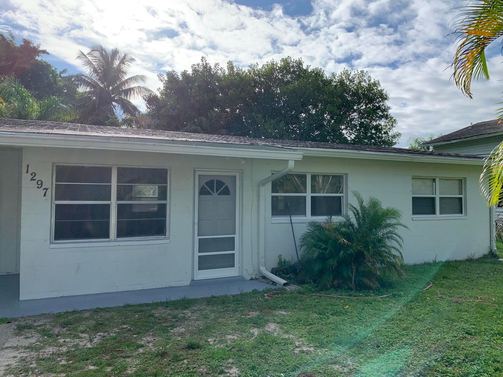 Photo of 1297 NW Charlie Green Drive, Stuart, FL 34994 (MLS # RX-11120505)