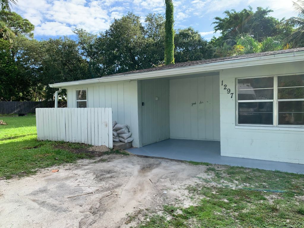 Photo of 1297 NW Charlie Green Drive, Stuart, FL 34994 (MLS # RX-11120505)