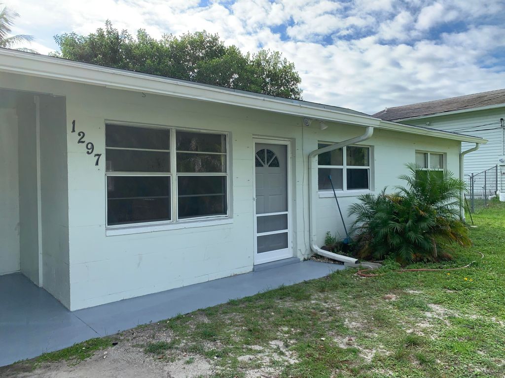 Photo of 1297 NW Charlie Green Drive, Stuart, FL 34994 (MLS # RX-11120505)