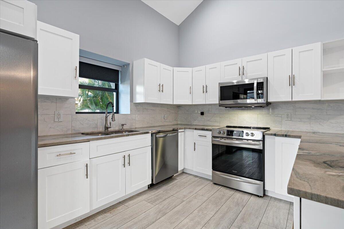 Property for Sale at 302 Summerwinds Lane, Jupiter, Palm Beach County, Florida - Bedrooms: 4 
Bathrooms: 3  - $445,000