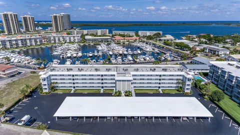 Photo of 907 Marina Drive #402, North Palm Beach, FL 33408 (MLS # RX-11067947)