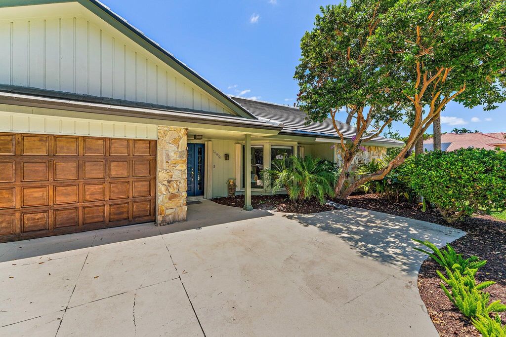 Photo of 12820 Calais Circle, Palm Beach Gardens, FL 33410 (MLS # RX-11067882)