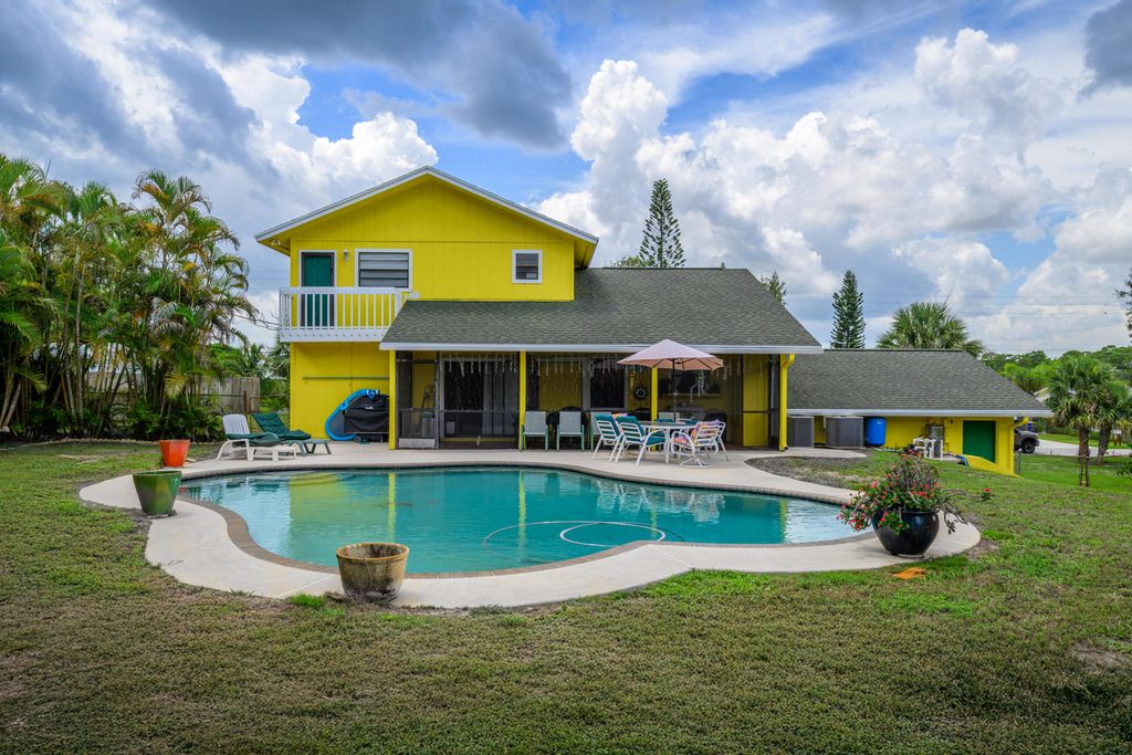Photo of 9291 SE Duncan Street, Hobe Sound, FL 33455 (MLS # RX-11105461)