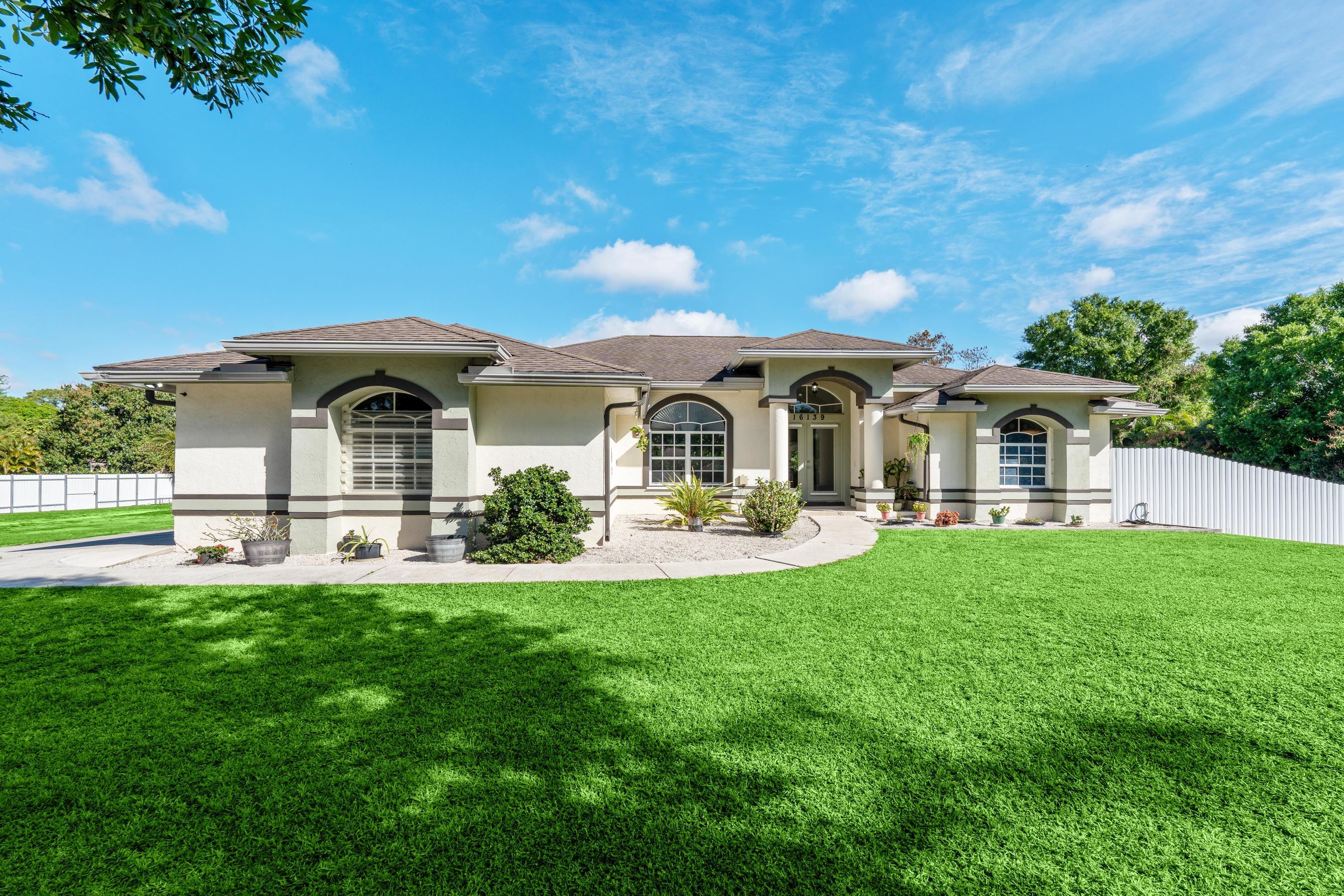 Property for Sale at 16139 E Pleasure Drive, The Acreage, Palm Beach County, Florida - Bedrooms: 4 
Bathrooms: 2  - $724,000