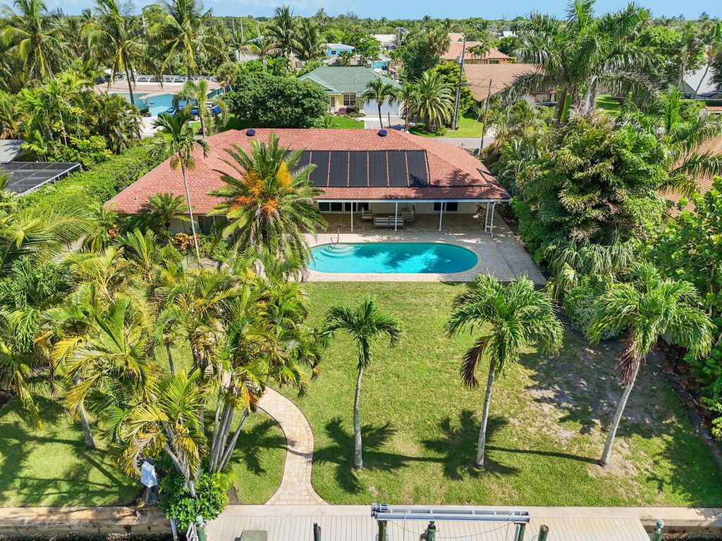 Photo of 8318 SE Coconut Street, Hobe Sound, FL 33455 (MLS # RX-11103726)