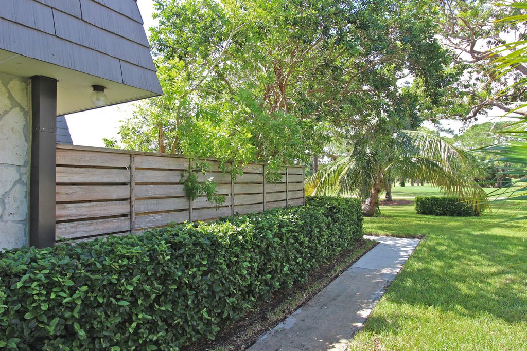 Photo of 1319 13th Terrace #1319, Palm Beach Gardens, FL 33418 (MLS # RX-10978722)