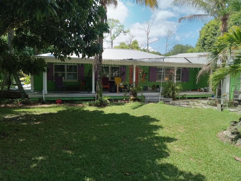 Photo of 5820 SE Smith Avenue, Stuart, FL 34997 (MLS # RX-11124820)