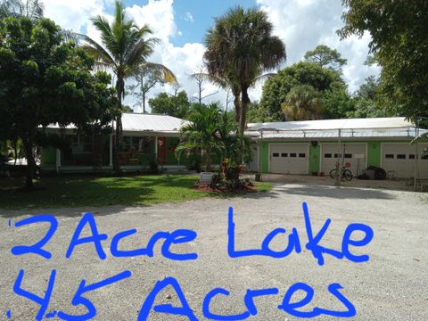 Photo of 5820 SE Smith Avenue, Stuart, FL 34997 (MLS # RX-11124820)
