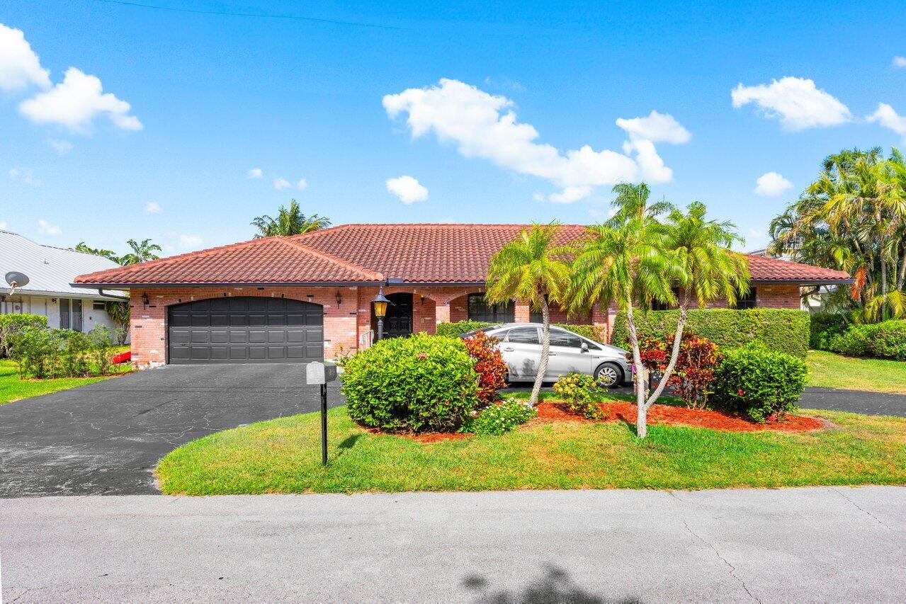 3163 Ne 8th Avenue, Boca Raton, Palm Beach County, Florida - 4 Bedrooms  
3 Bathrooms - 