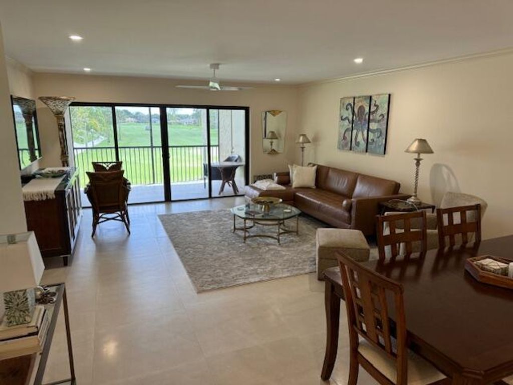 Photo of 13403 Touchstone Place #203, Palm Beach Gardens, FL 33418 (MLS # RX-11001061)