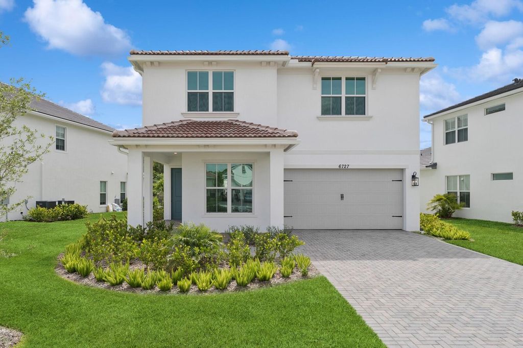 Photo of 6727 SE Lost Pine Drive #75, Stuart, FL 34997 (MLS # RX-11031400)