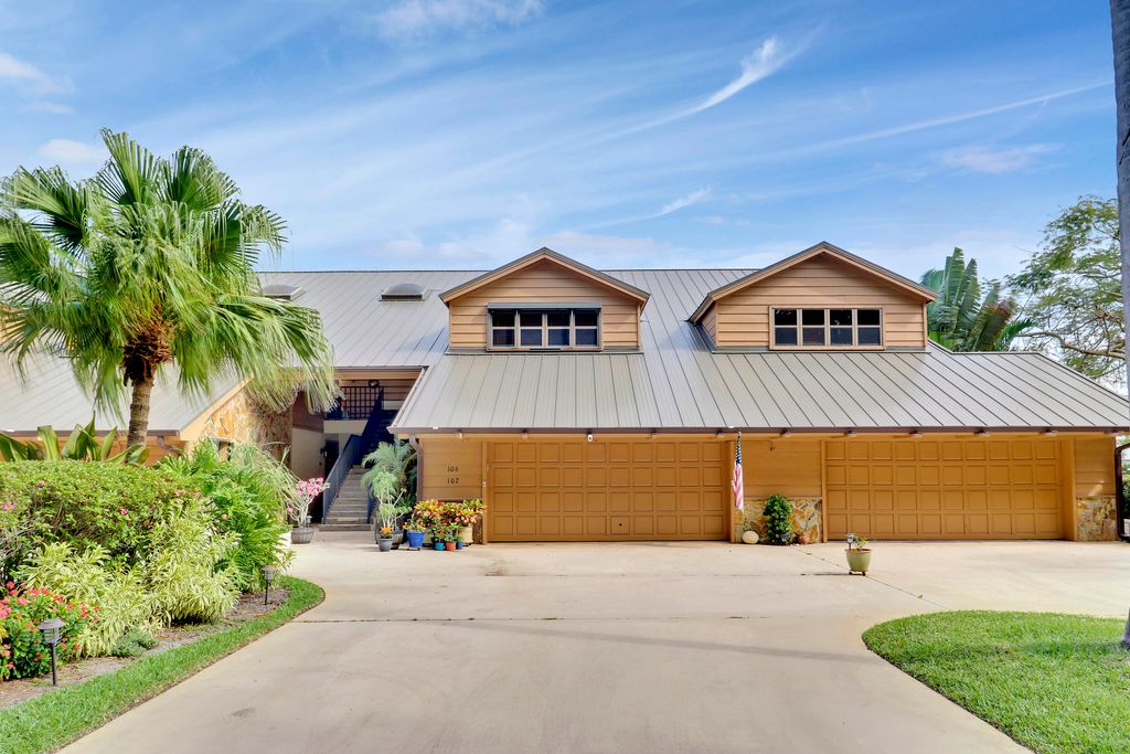 Photo of 102 SE Crestwood Circle, Stuart, FL 34997 (MLS # RX-11083954)