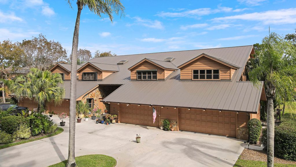 Photo of 102 SE Crestwood Circle, Stuart, FL 34997 (MLS # RX-11083954)