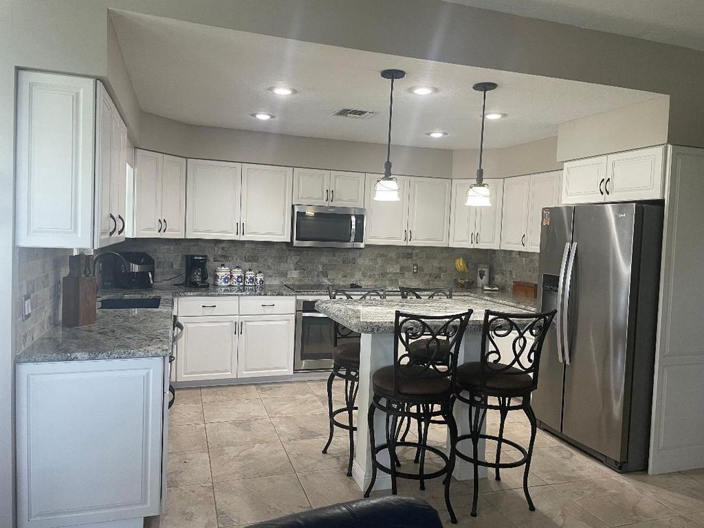 Photo of 717 W Fischer Circle, Sebastian, FL 32958 (MLS # RX-11125445)